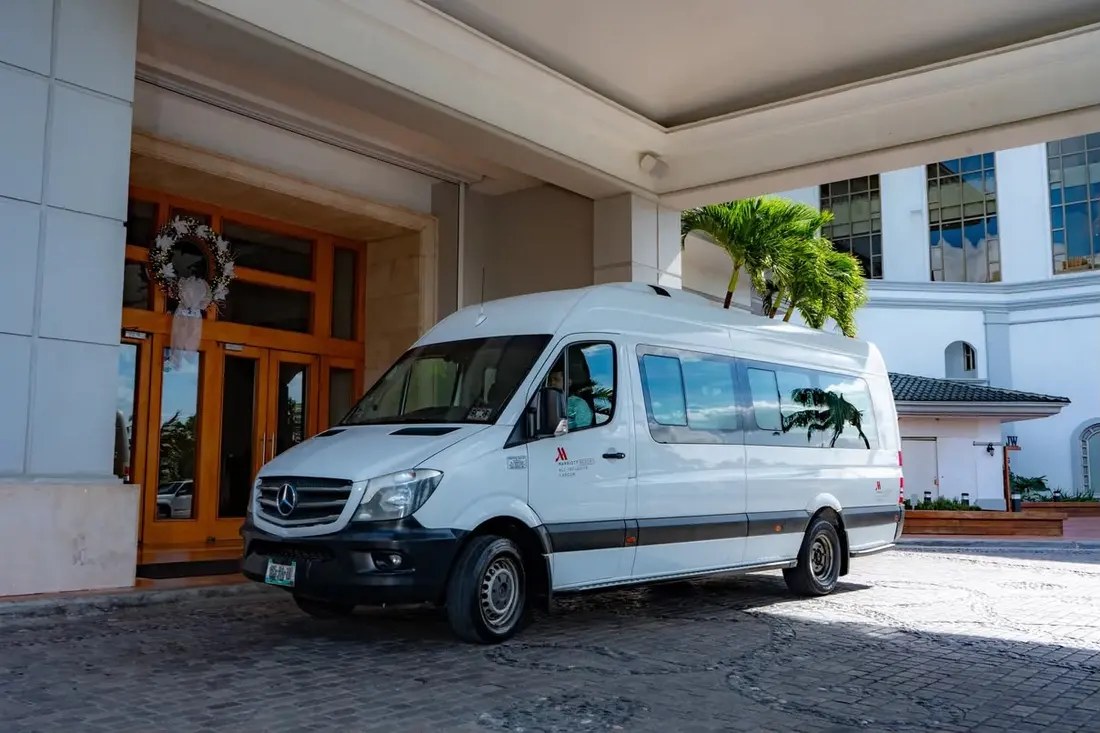 Mercedes-Benz Sprinter at a resort entrance